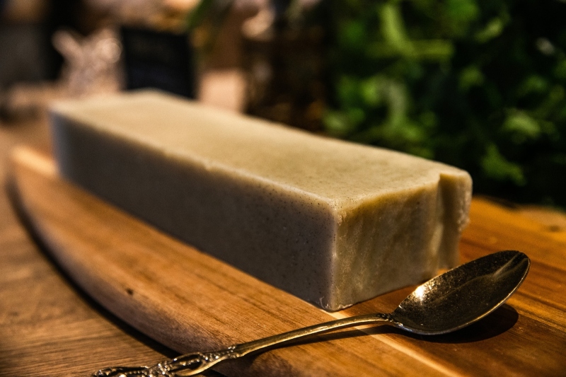 This soap is made from natural Okinawan clay and is soft enough to use a spoon with. Take just as much as you need and put it in a small bag to take to your room.