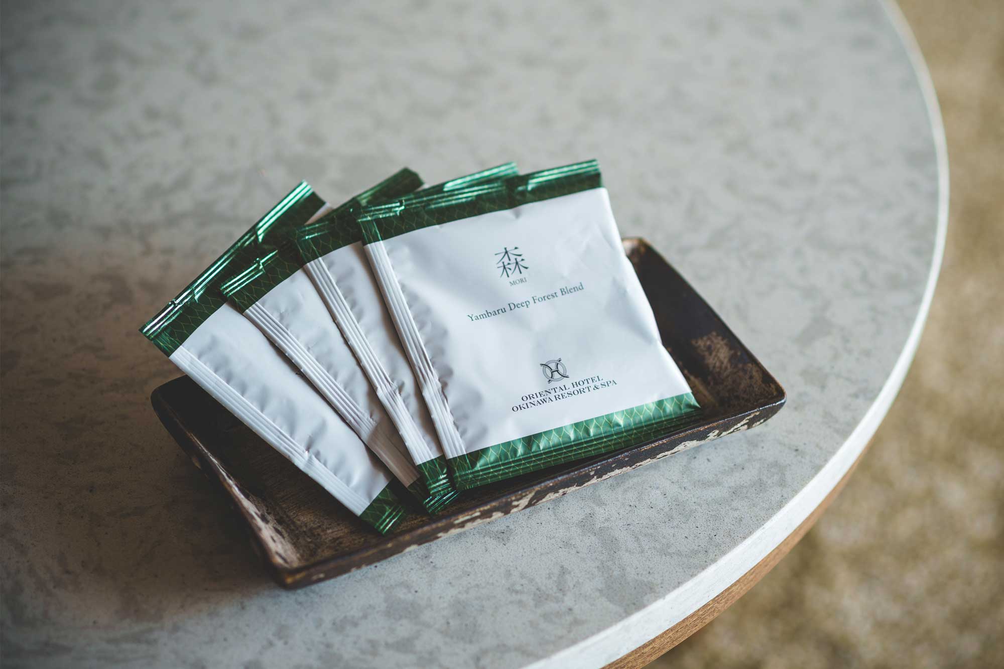 The Yambaru Forest Design Pattern used on the hotel's original blend coffee package featuring Okinawan-grown coffee beans